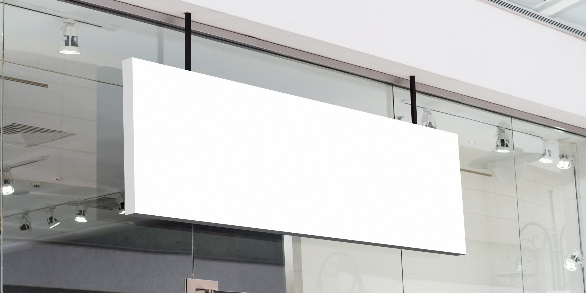 horizontal white signage on shop front