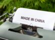 Image of old printer with paper spelling "made in China" Catdi Houston printing shop